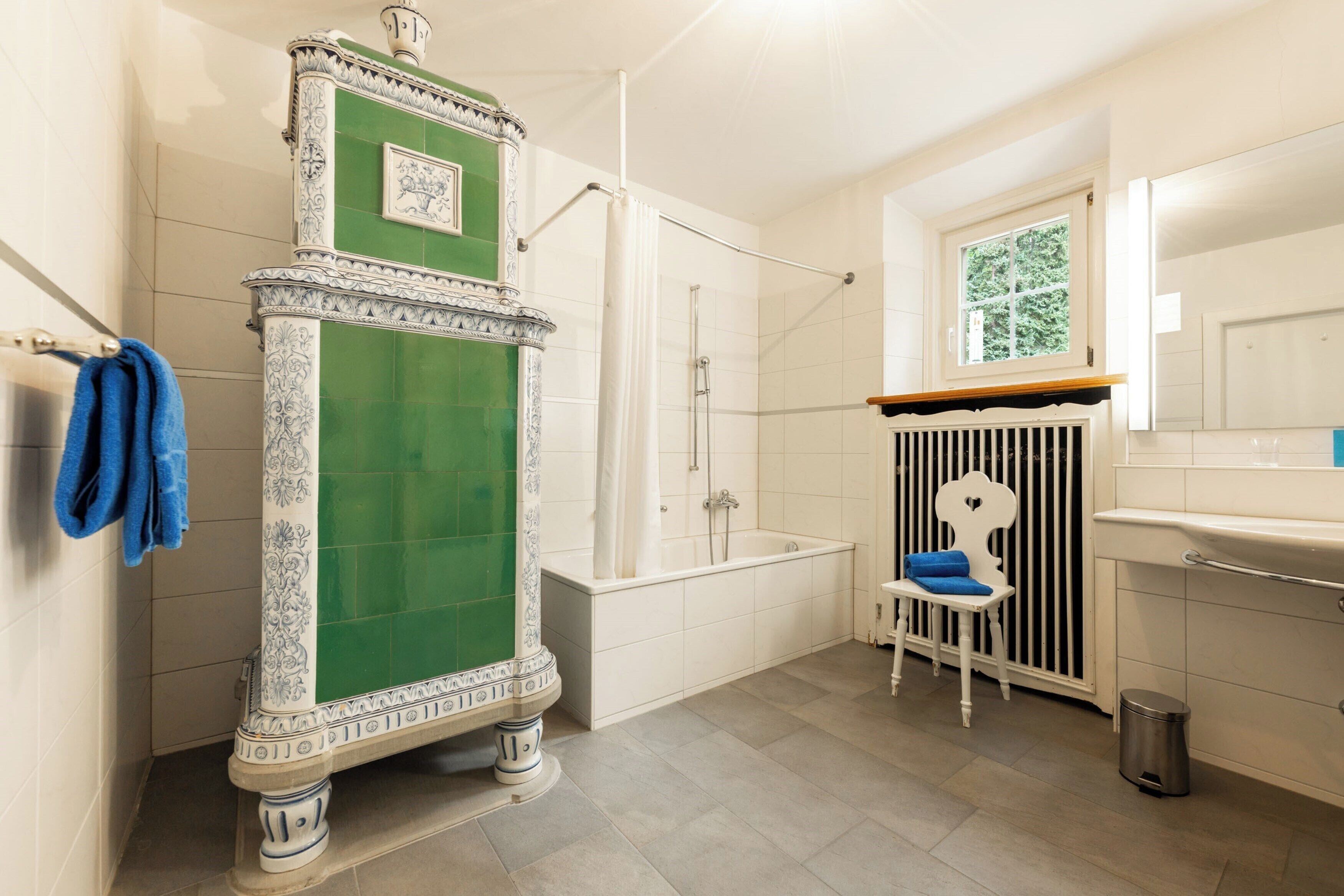 superior double room | bathroom | deep-soaking bathtub, hair dryer, towels