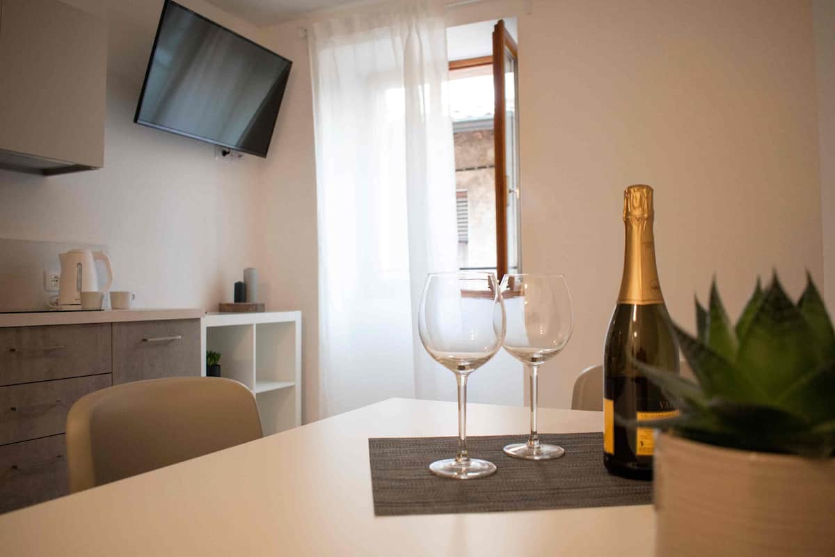 Comfort Apartment | Living area | Flat-screen TV