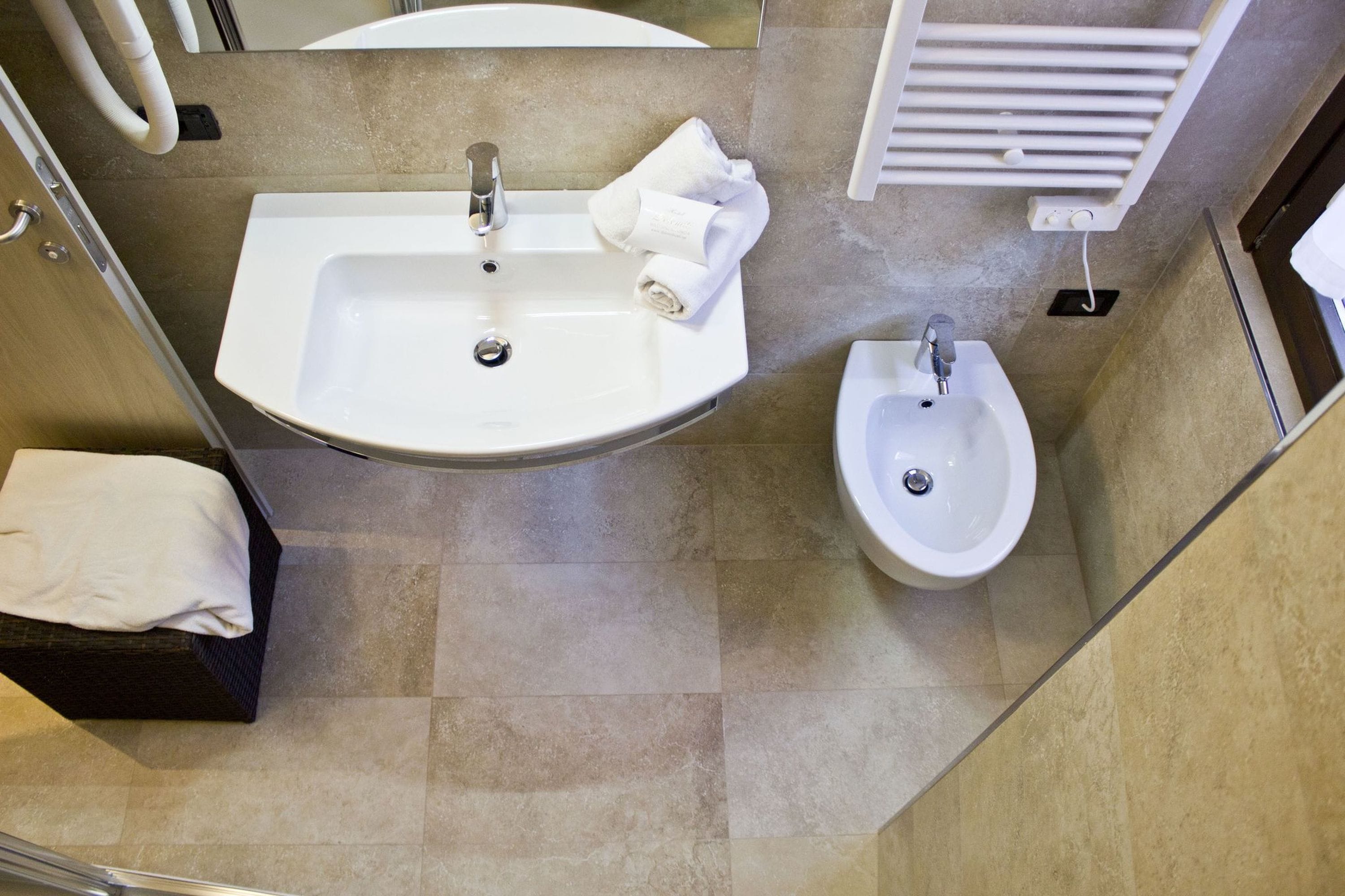 free toiletries, hair dryer, bidet, towels