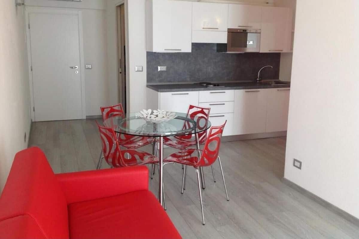 Panoramic Apartment | Living area | Flat-screen TV