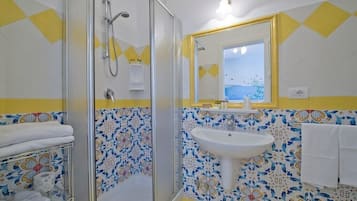 Superior Room, Sea View | Bathroom | Shower, hair dryer, slippers, towels