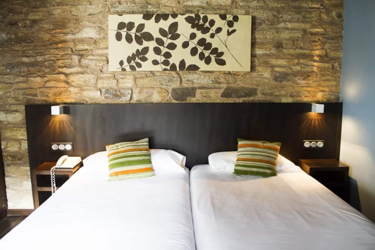 Premium bedding, down duvets, in-room safe, desk