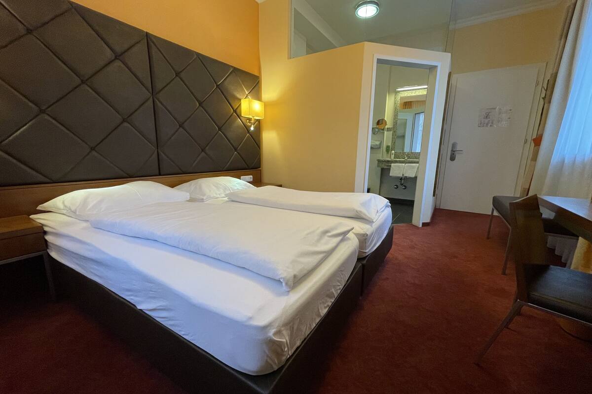 single room | 2 bedrooms, in-room safe, individually furnished, desk