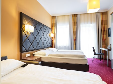 Triple Room | 2 bedrooms, in-room safe, individually furnished, desk