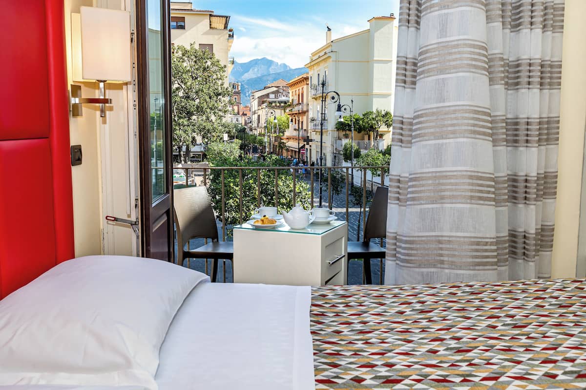 Premium bedding, pillow-top beds, minibar, in-room safe