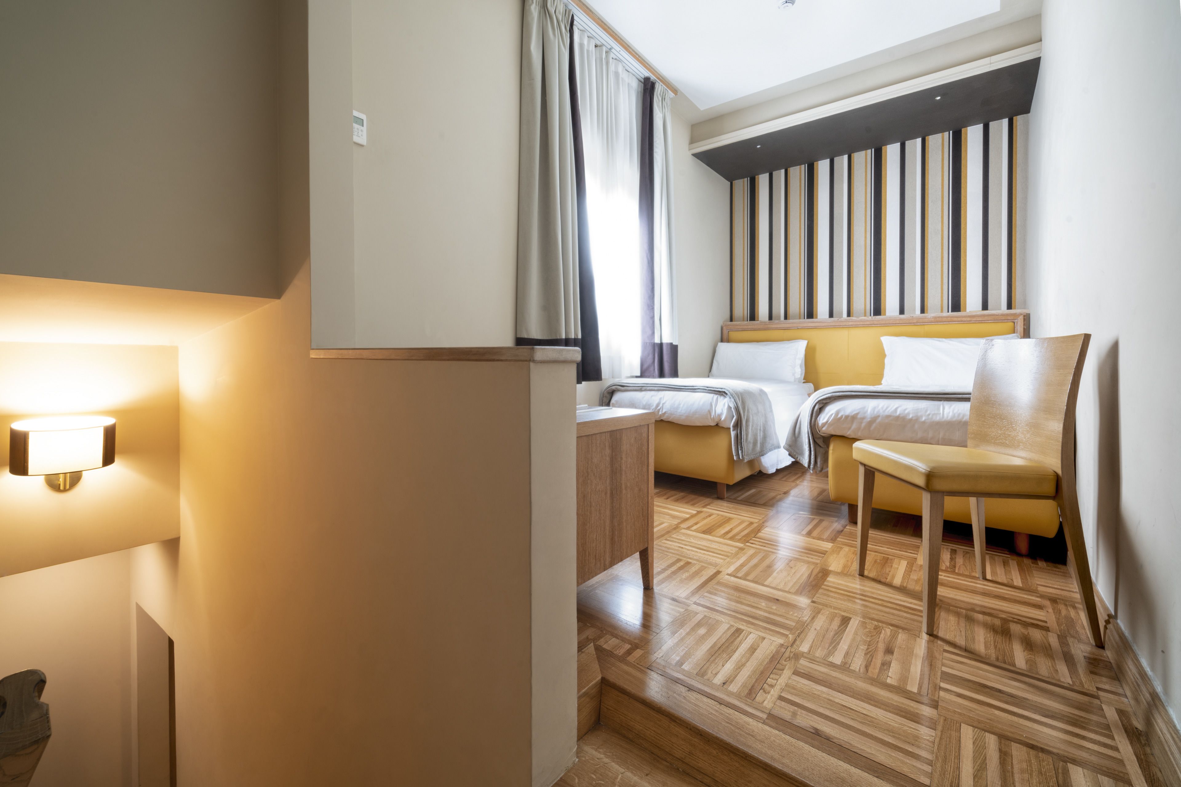 family suite | in-room safe, desk, laptop workspace, blackout curtains