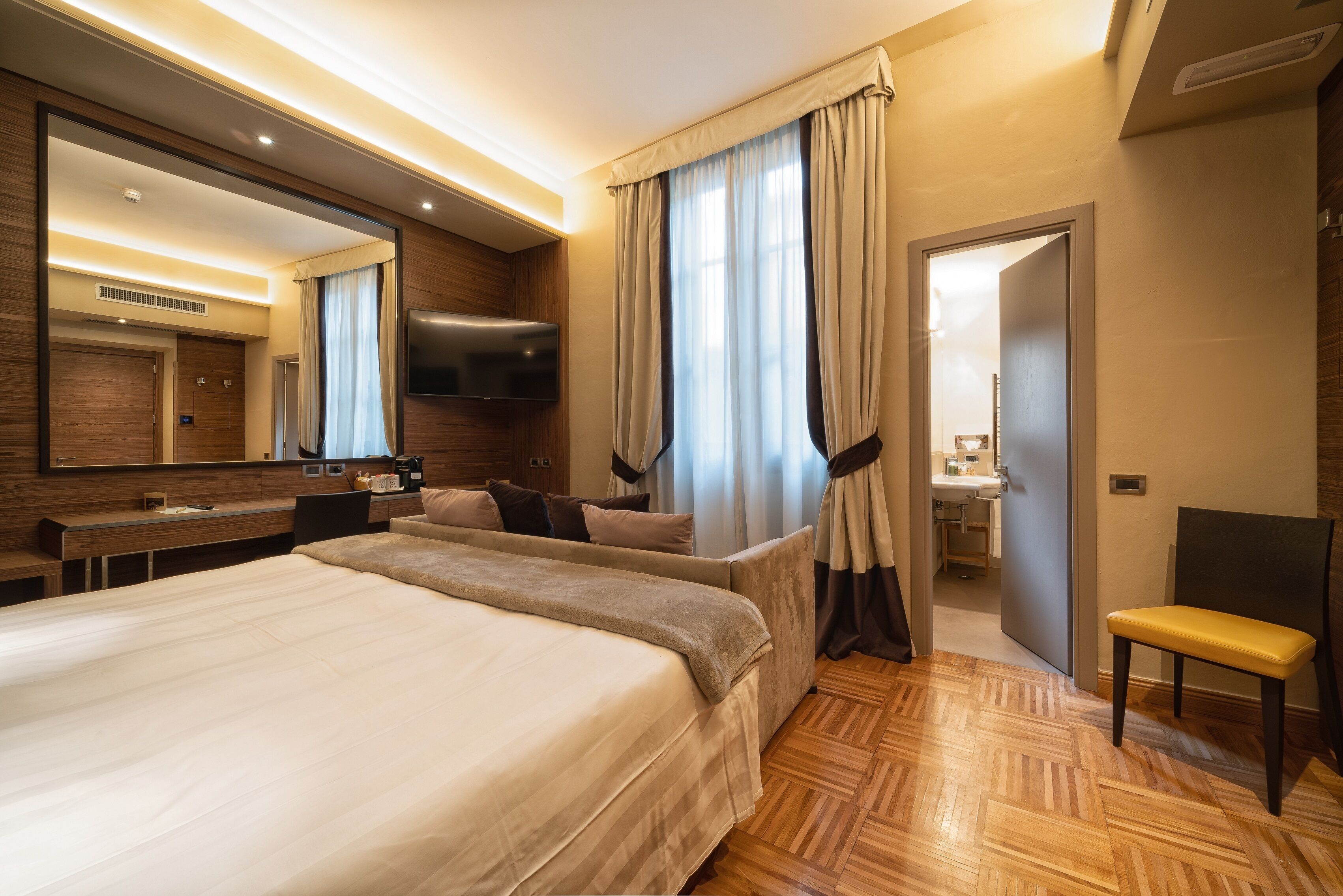 comfort triple room | in-room safe, desk, laptop workspace, blackout curtains