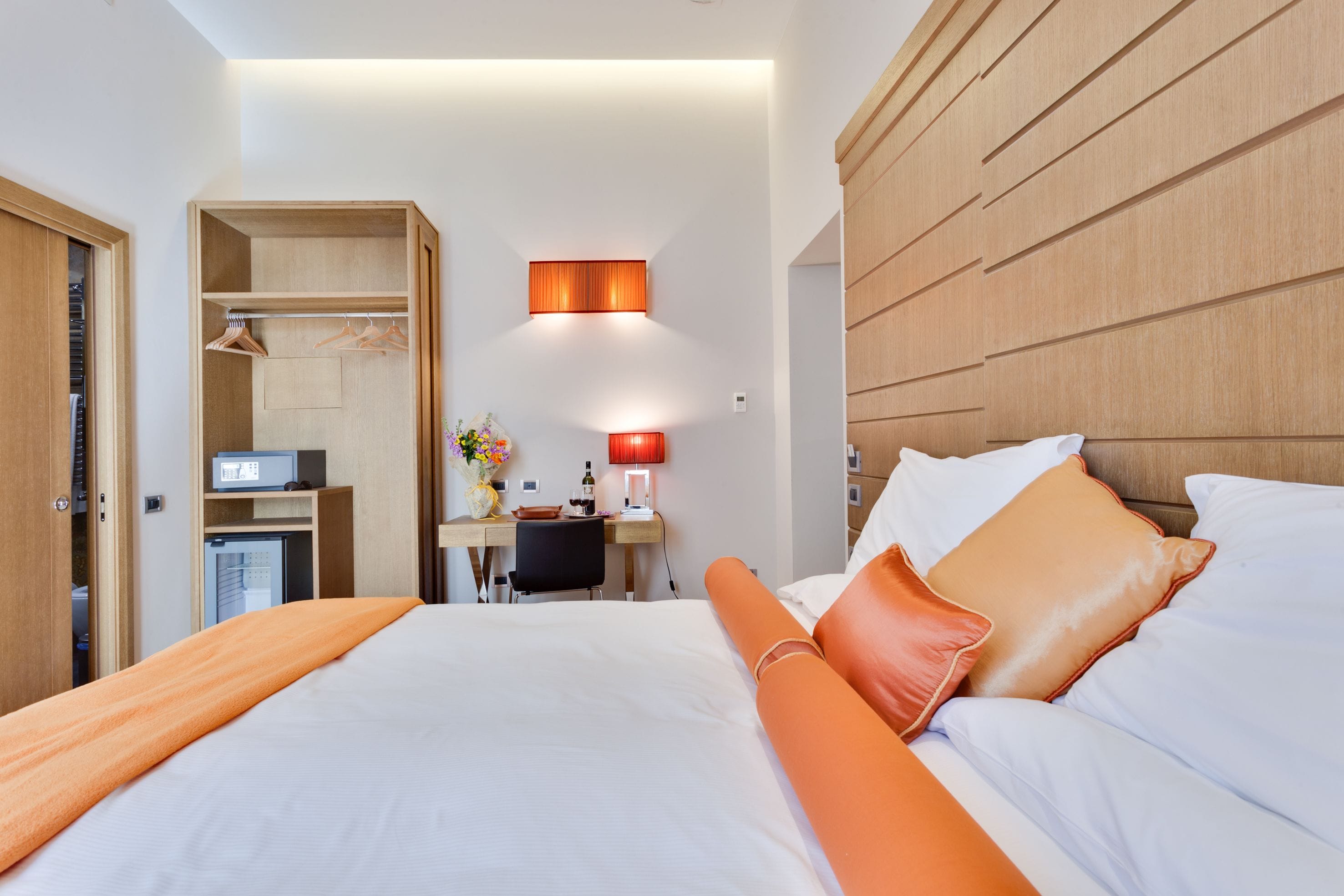 deluxe double or twin room, city view | in-room safe, desk, laptop workspace, blackout curtains