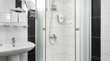 Shower, free toiletries, hair dryer, slippers