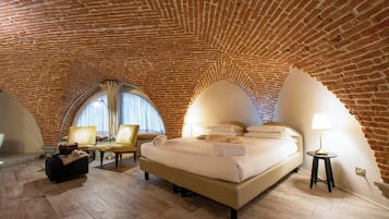 Suite | Ropa de cama de alta calidad, edredón, camas Select Comfort y minibar