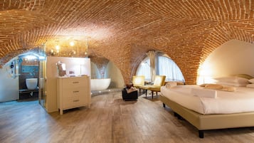 Suite | Ropa de cama de alta calidad, edredón, camas Select Comfort y minibar