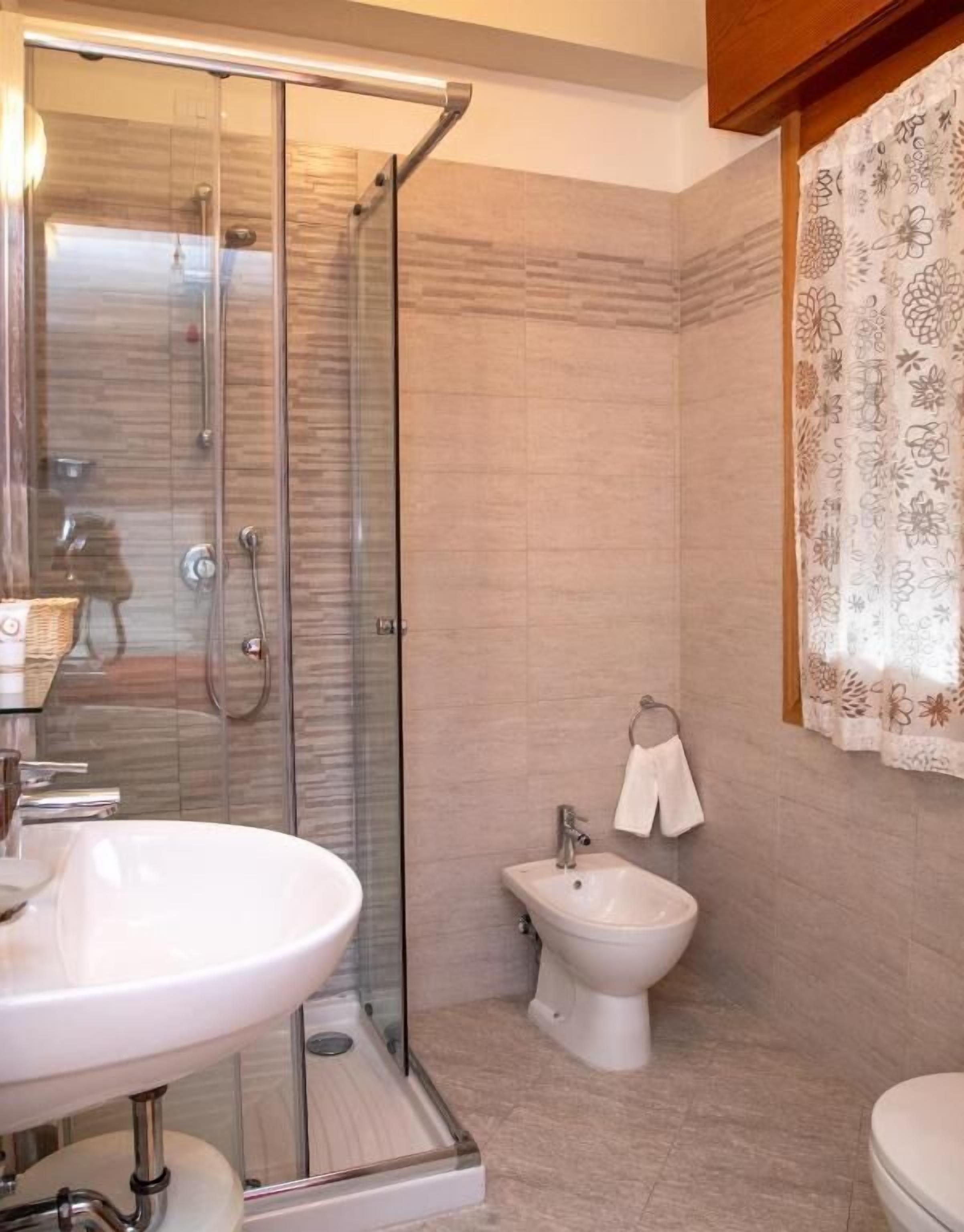 shower, bidet, towels