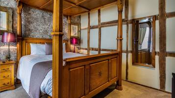 Deluxe Suite | Premium bedding, desk, blackout curtains, iron/ironing board