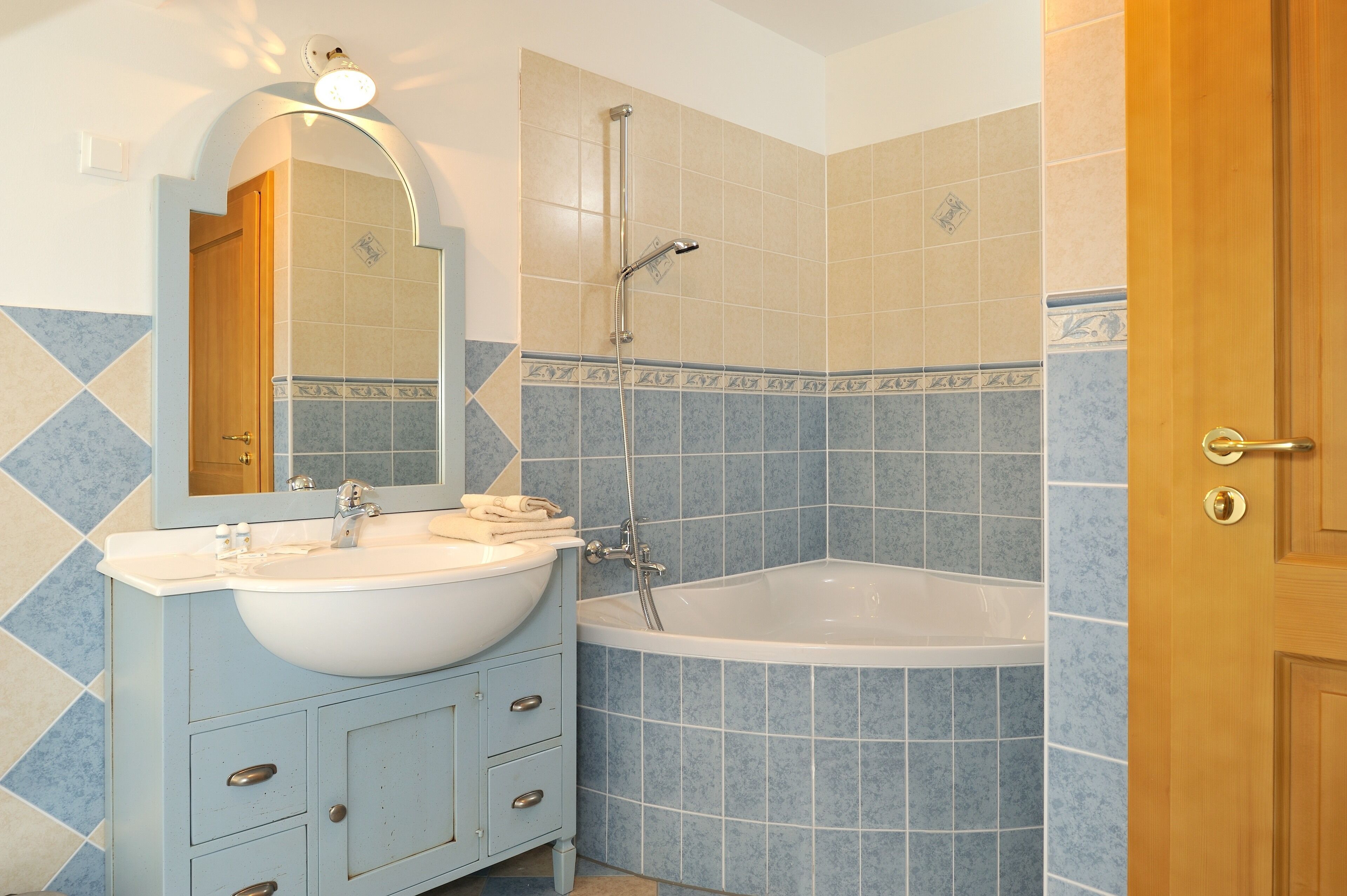 superior room | bathroom | shower, hair dryer, towels