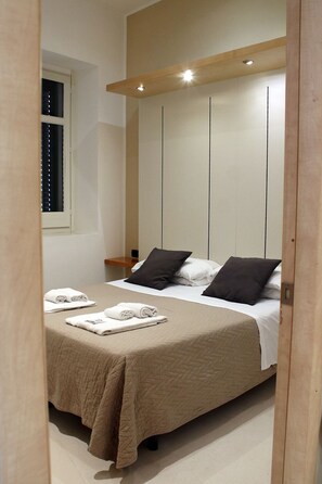 Chambre quadruple | Coffre-fort, accĂšs au Wi-Fi (inclus), literie fournie