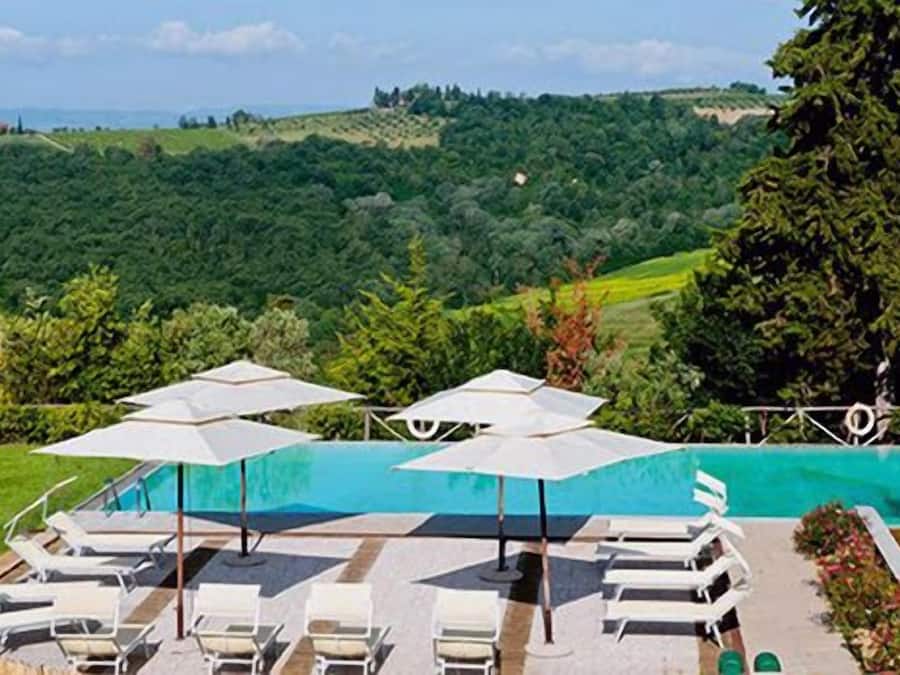 Seasonal outdoor pool, pool umbrellas, pool loungers