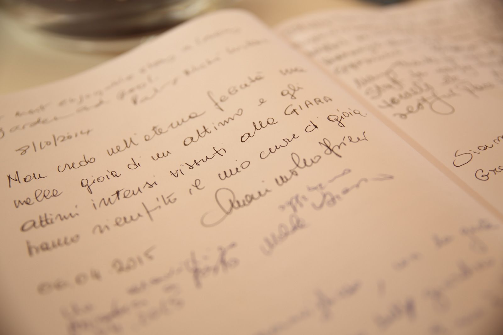 A close-up of a handwritten note in a notebook.