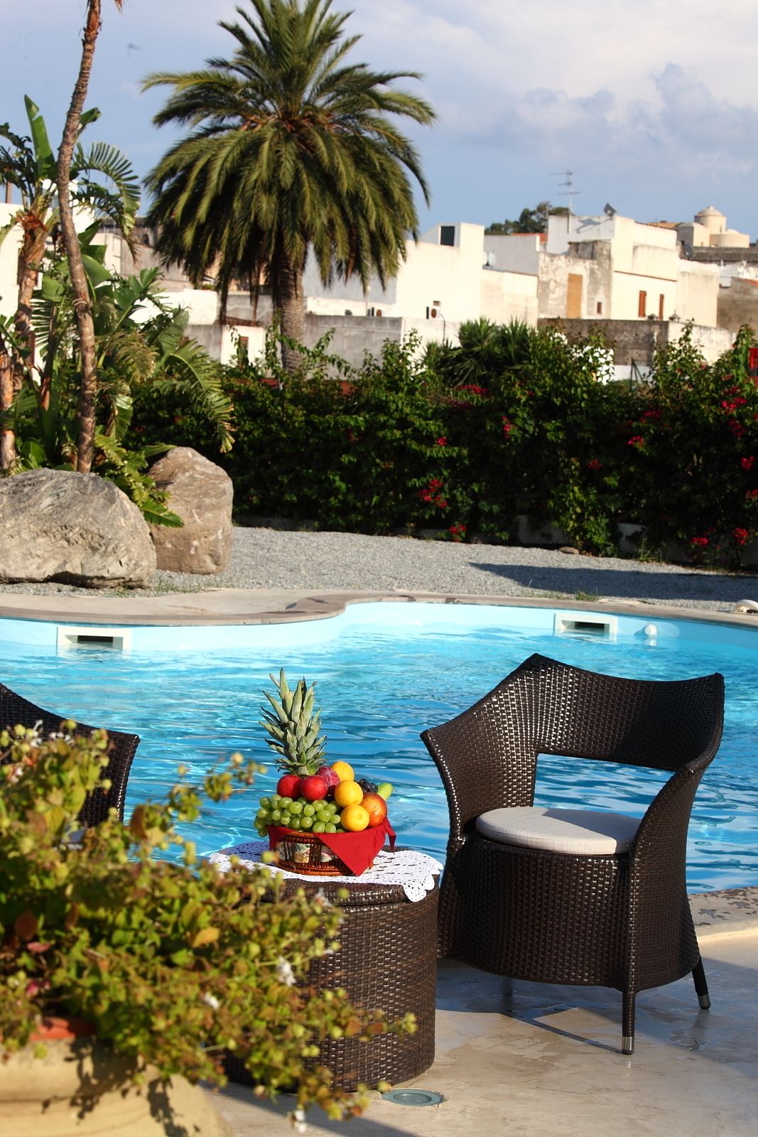 Seasonal outdoor pool, pool umbrellas, pool loungers