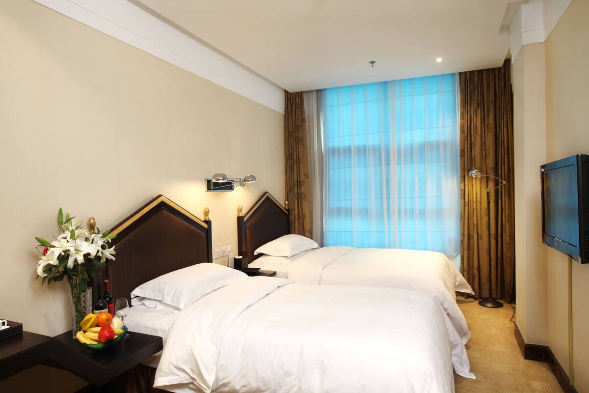 Desk, blackout drapes, rollaway beds (surcharge), WiFi (free)