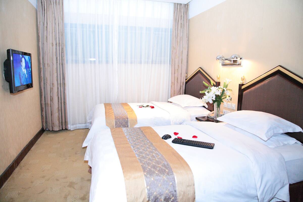 Desk, blackout drapes, rollaway beds (surcharge), WiFi (free)