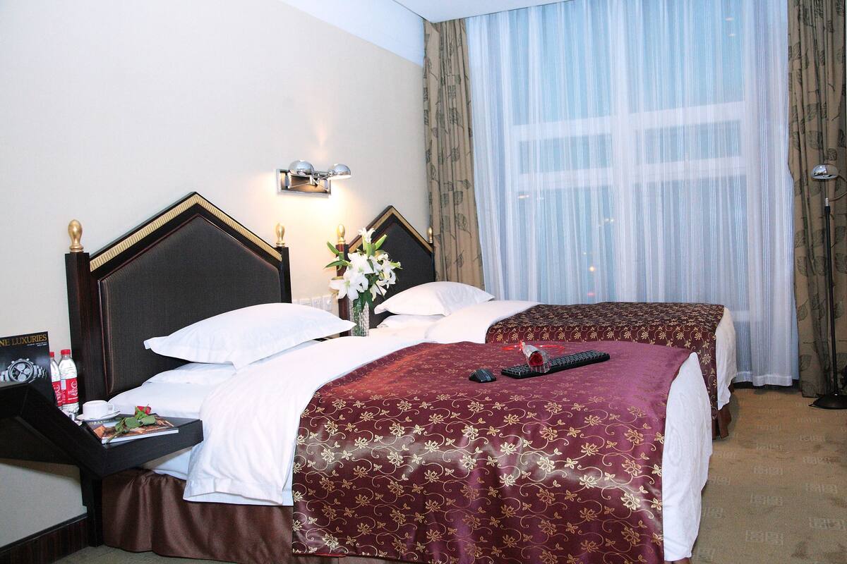 Desk, blackout drapes, rollaway beds (surcharge), WiFi (free)