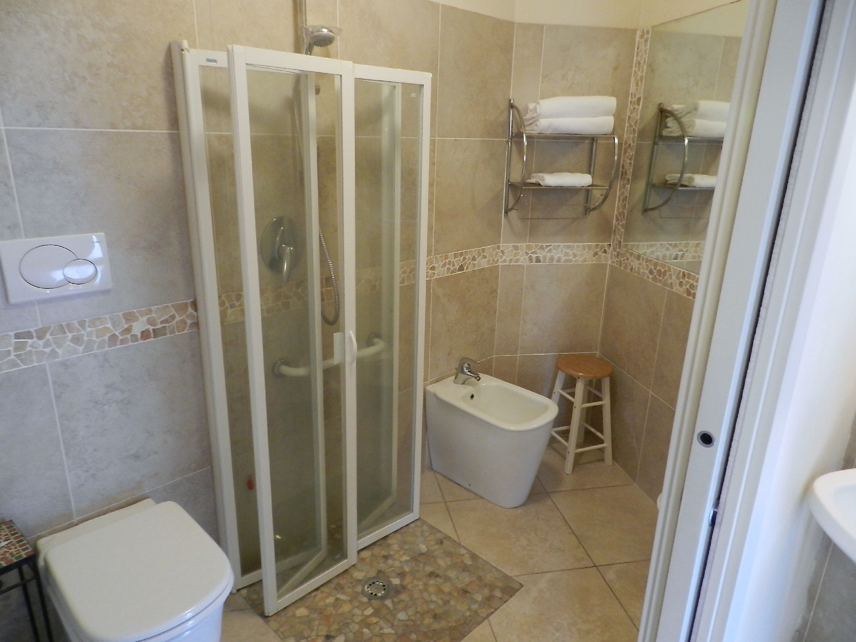 free toiletries, hair dryer, bidet, towels