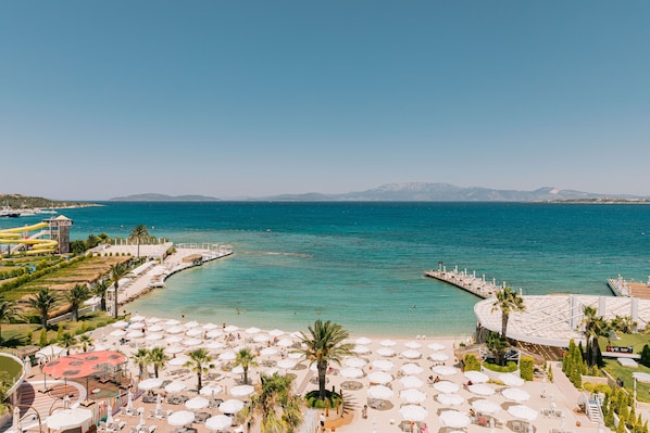 Private beach, white sand, free beach cabanas, sun-loungers