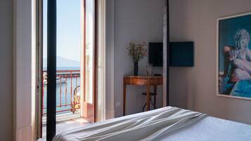 Deluxe Double Room, Balcony, Sea View | Down comforters, minibar, in-room safe, iron/ironing board