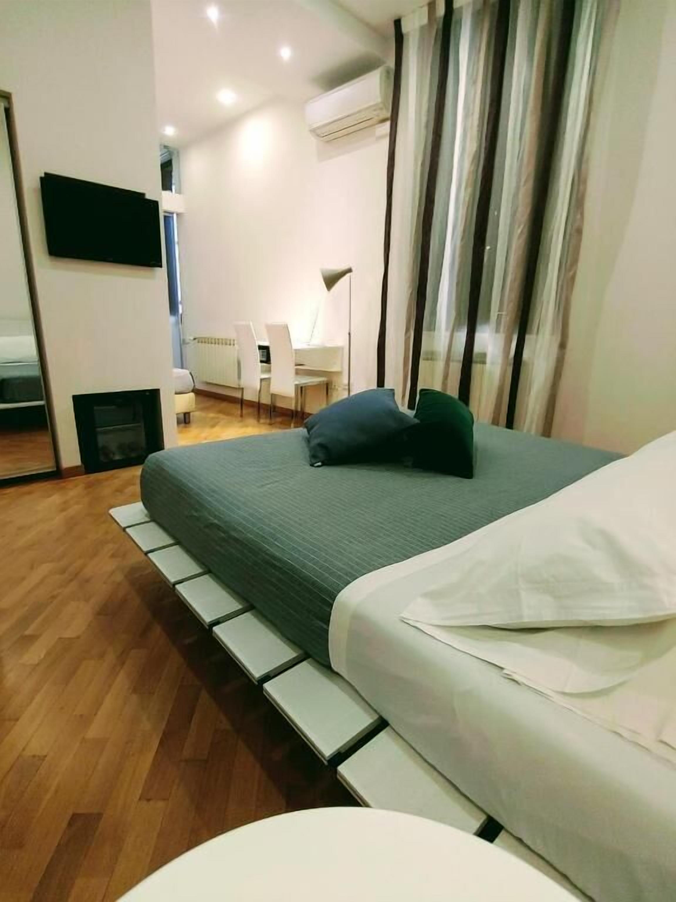 junior studio suite | 2 bedrooms, premium bedding, minibar, in-room safe