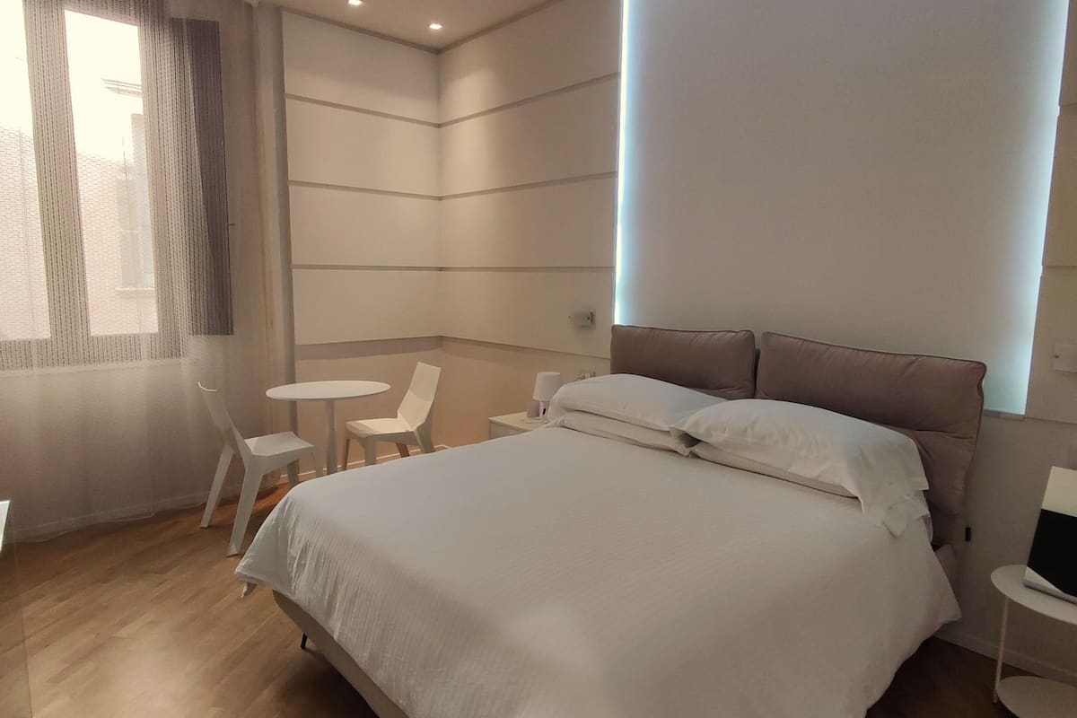 junior suite | 2 bedrooms, premium bedding, minibar, in-room safe