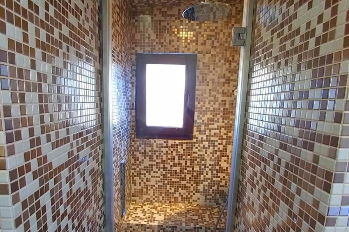 shower, free toiletries, hair dryer, bathrobes