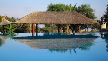 Outdoor pool, pool umbrellas, sun loungers