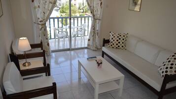 Apartment, 2 Bedrooms | Living area | LCD TV