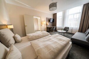 Double Room | Desk, iron/ironing board, cribs/infant beds, rollaway beds