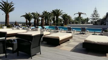 Outdoor pool, sun loungers