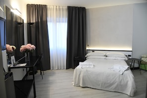 In-room safe, desk, blackout curtains, iron/ironing board