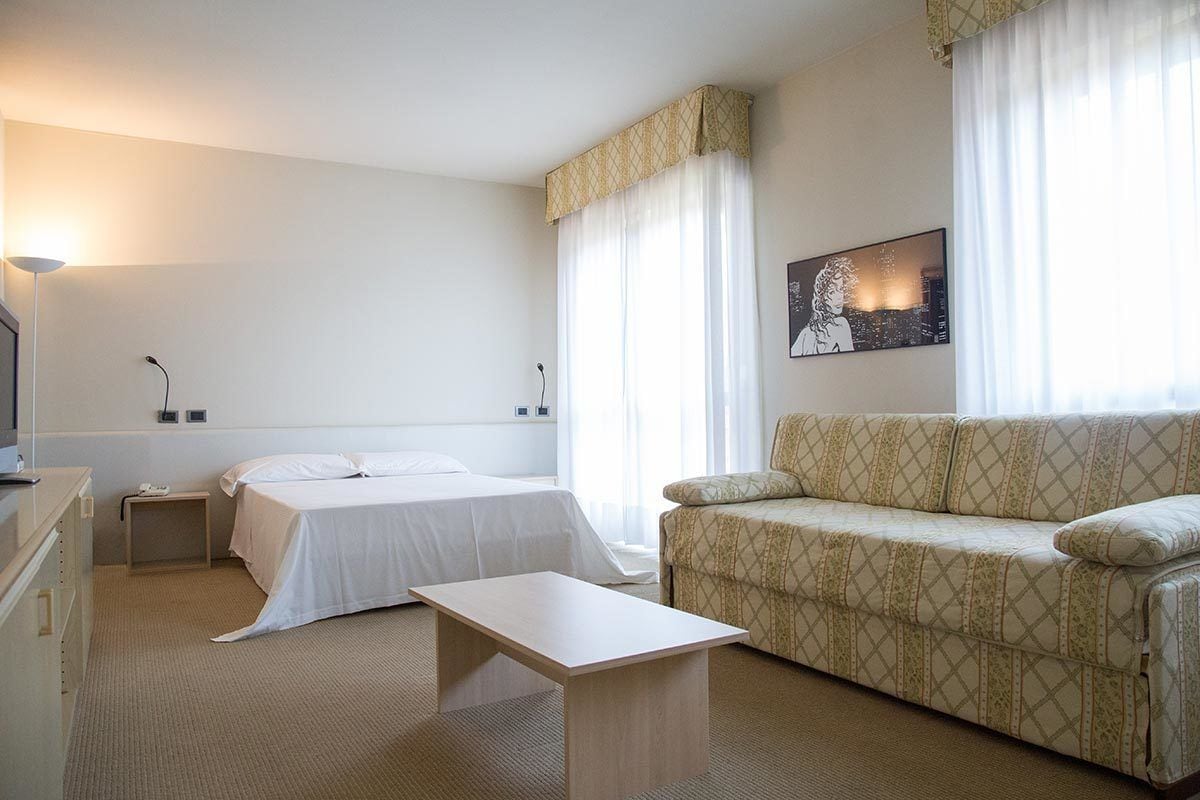 family suite, 2 bedrooms | in-room safe, desk, blackout curtains, iron/ironing board