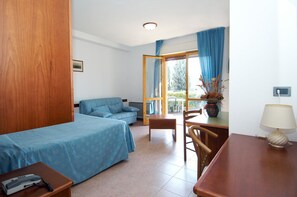 Family Room, 2 Bedrooms, Partial Lake View | Desk, free WiFi, bed sheets, wheelchair access - Villaggio Albergo il Gabbiano (Passignano sul Trasimeno)