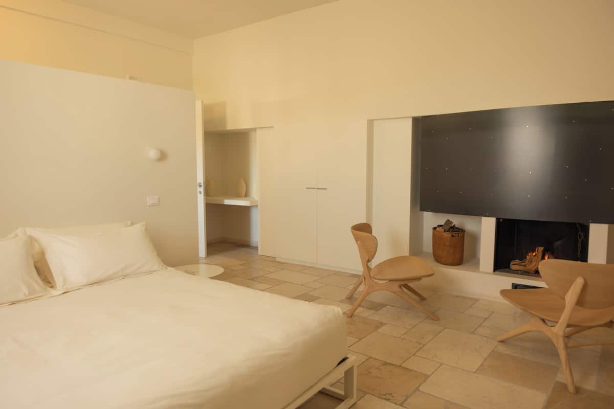 Luxury Suite (Seno del Canneto) | Premium bedding, minibar, in-room safe, individually decorated