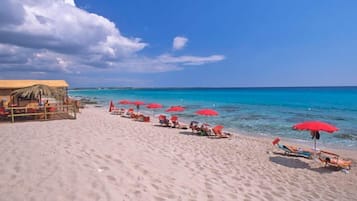 Private beach, white sand, sun-loungers, beach umbrellas