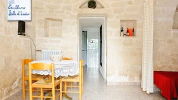 Traditional House (Trullo Fichi D'India) | Living area | Flat-screen TV, table tennis