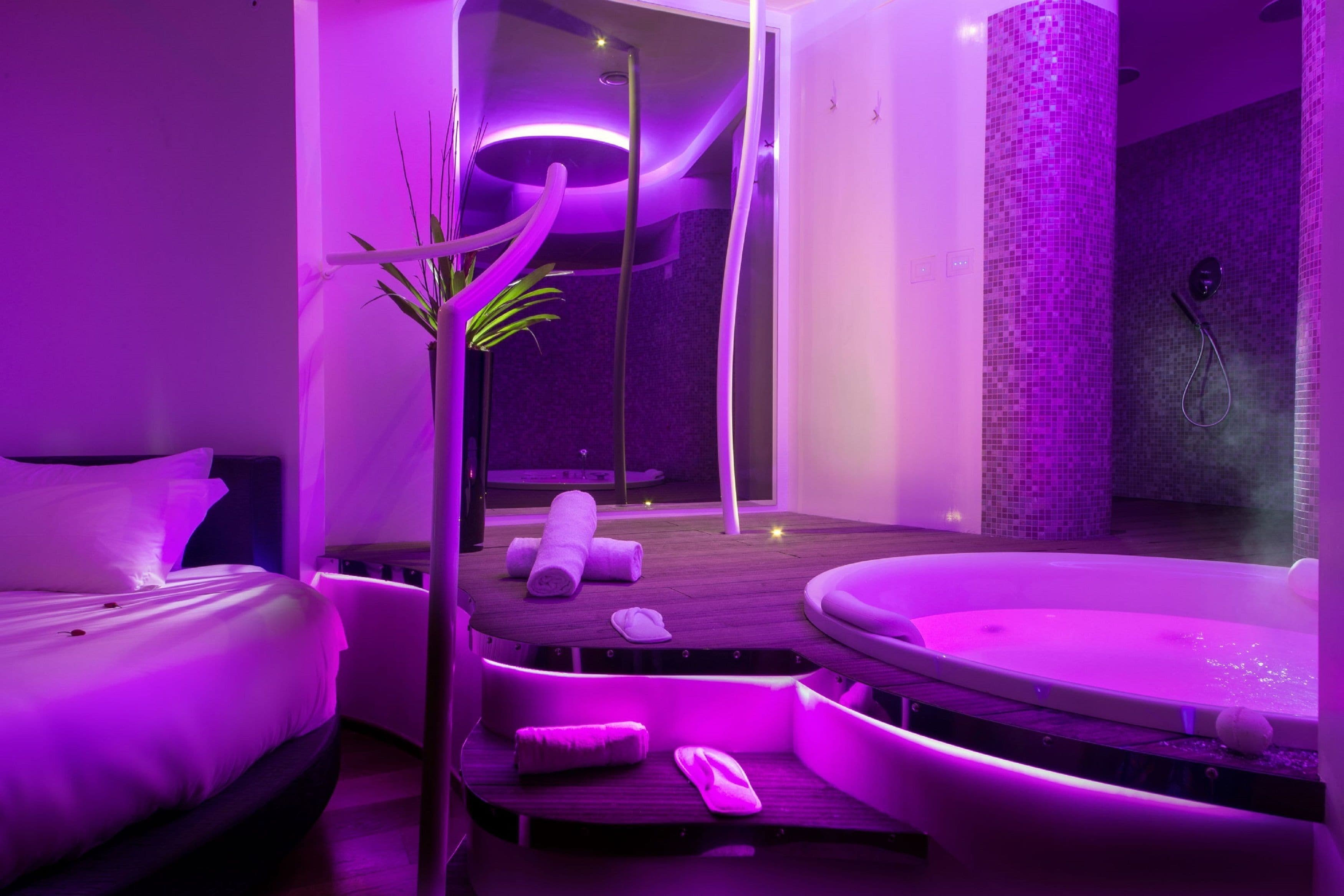 executive suite | bathroom | hair dryer, bidet, towels