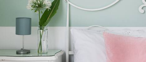 Down duvets, desk, blackout curtains, rollaway beds