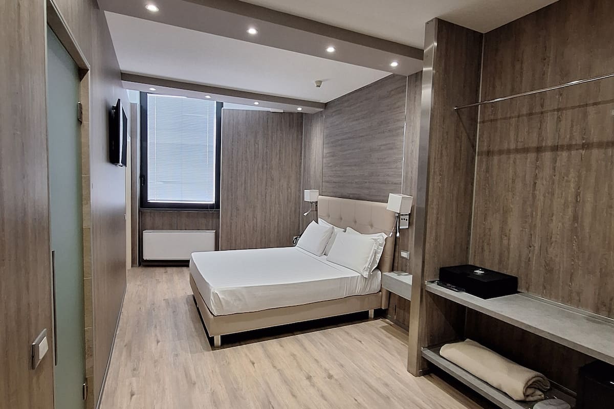 Camera Junior | Lenzuola Frette, materassi Select Comfort, minibar