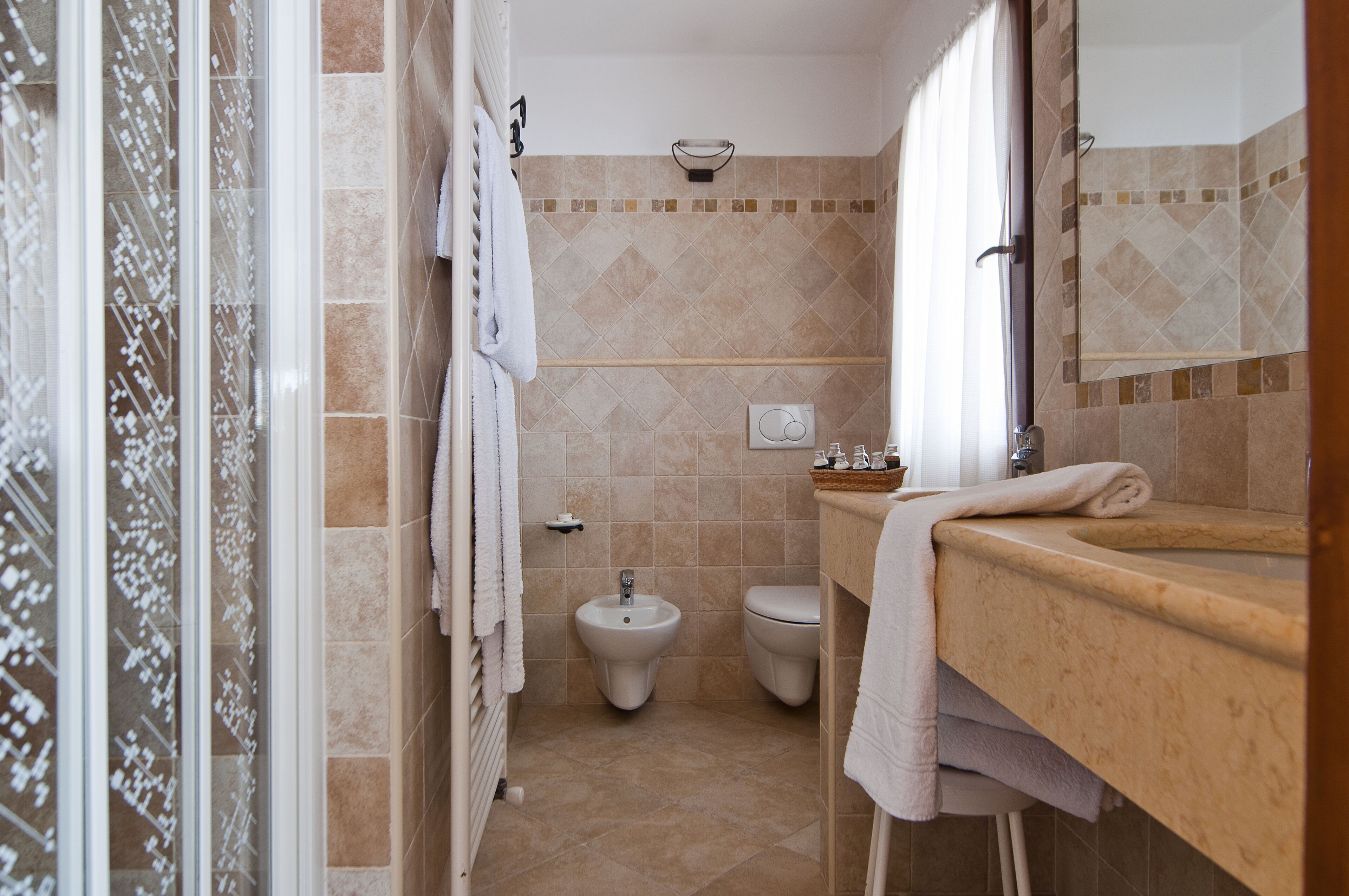 family room | bathroom | separate bathtub and shower, rainfall showerhead, free toiletries