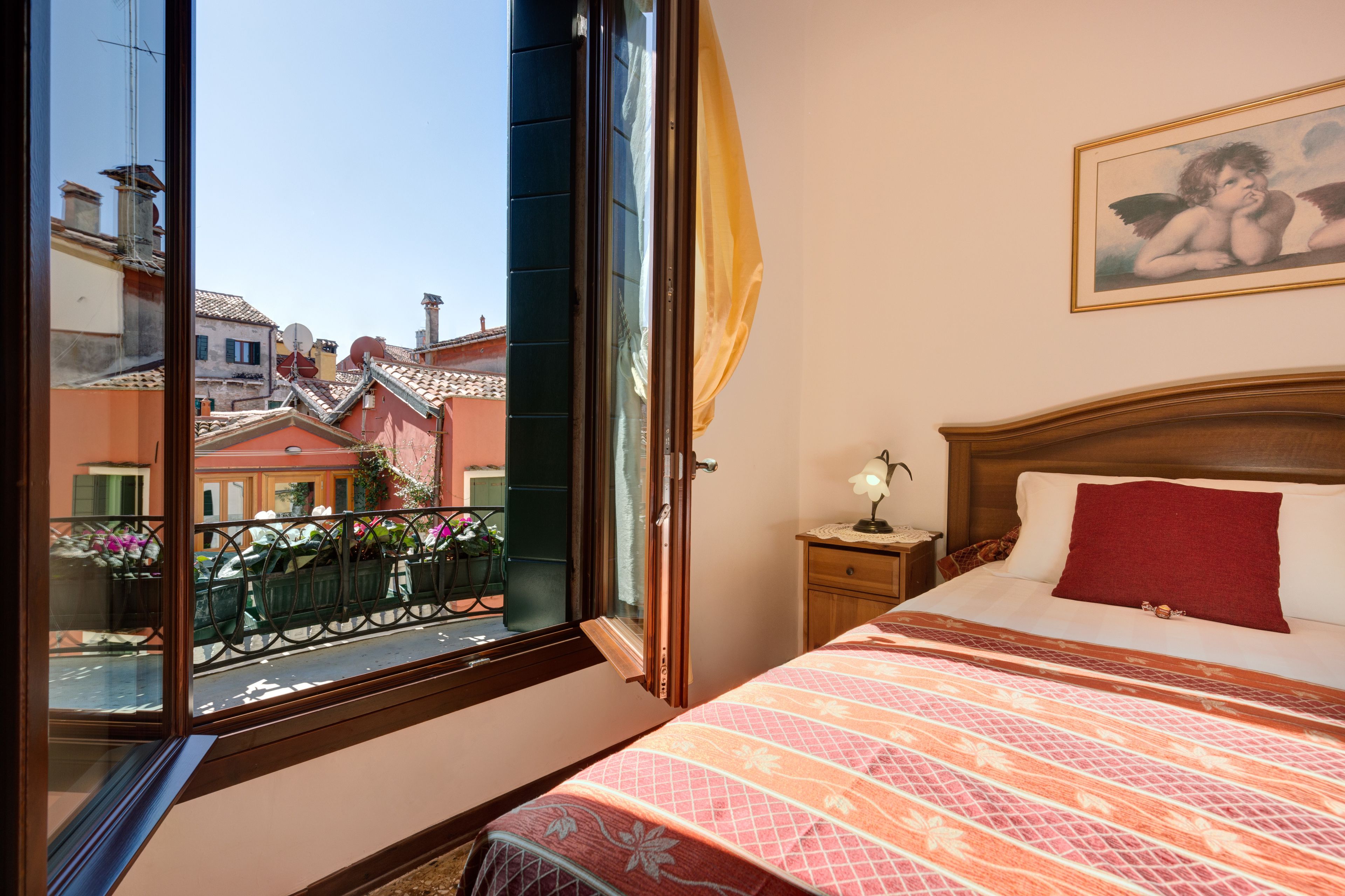 double room, balcony, city view | individually decorated, individually furnished, desk, iron/ironing board