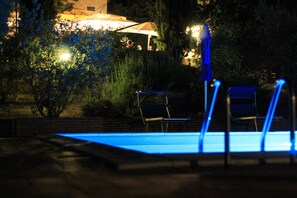 Seasonal outdoor pool, pool umbrellas, pool loungers