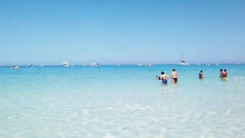 Private beach, white sand, sun-loungers, beach umbrellas