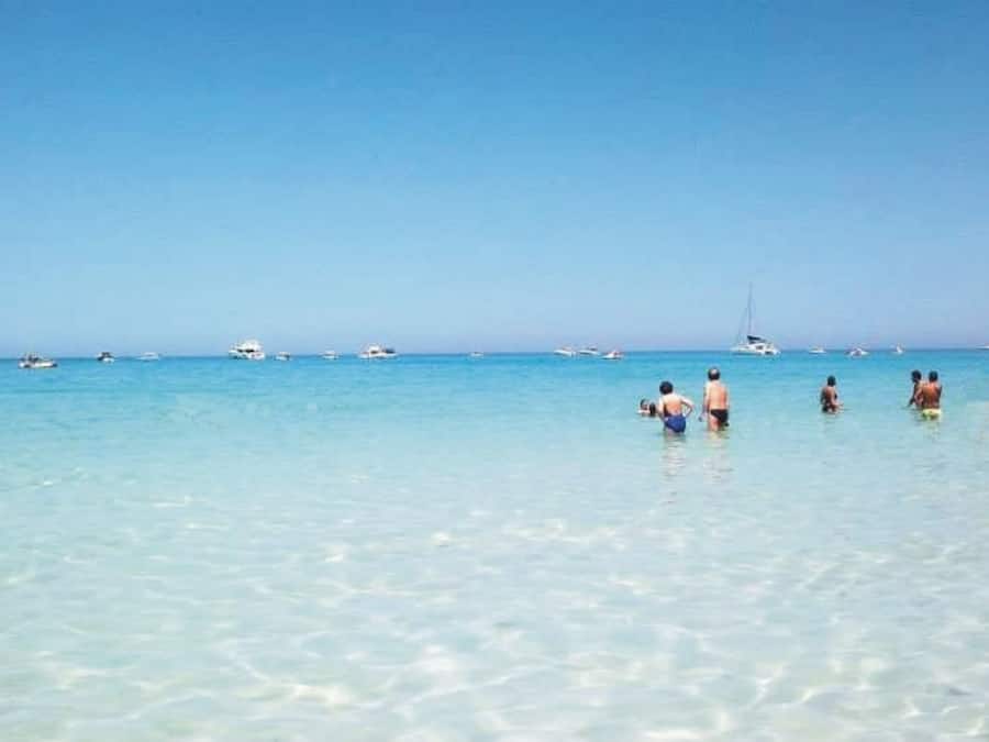 Private beach, white sand, sun loungers, beach umbrellas