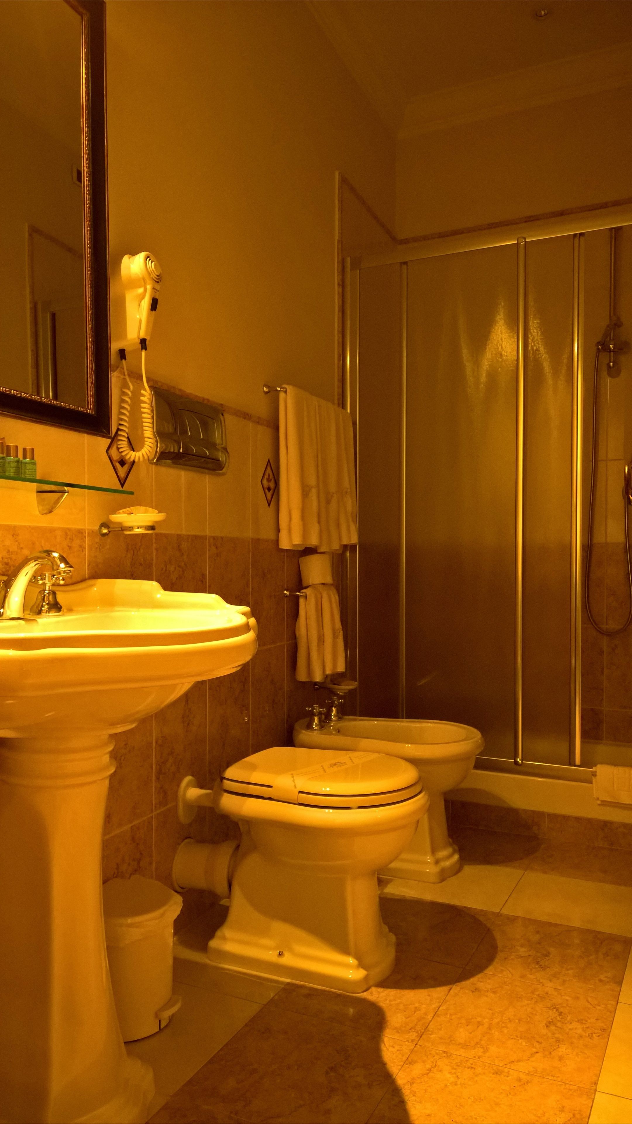 quadruple room | bathroom | shower, rainfall showerhead, free toiletries, hair dryer